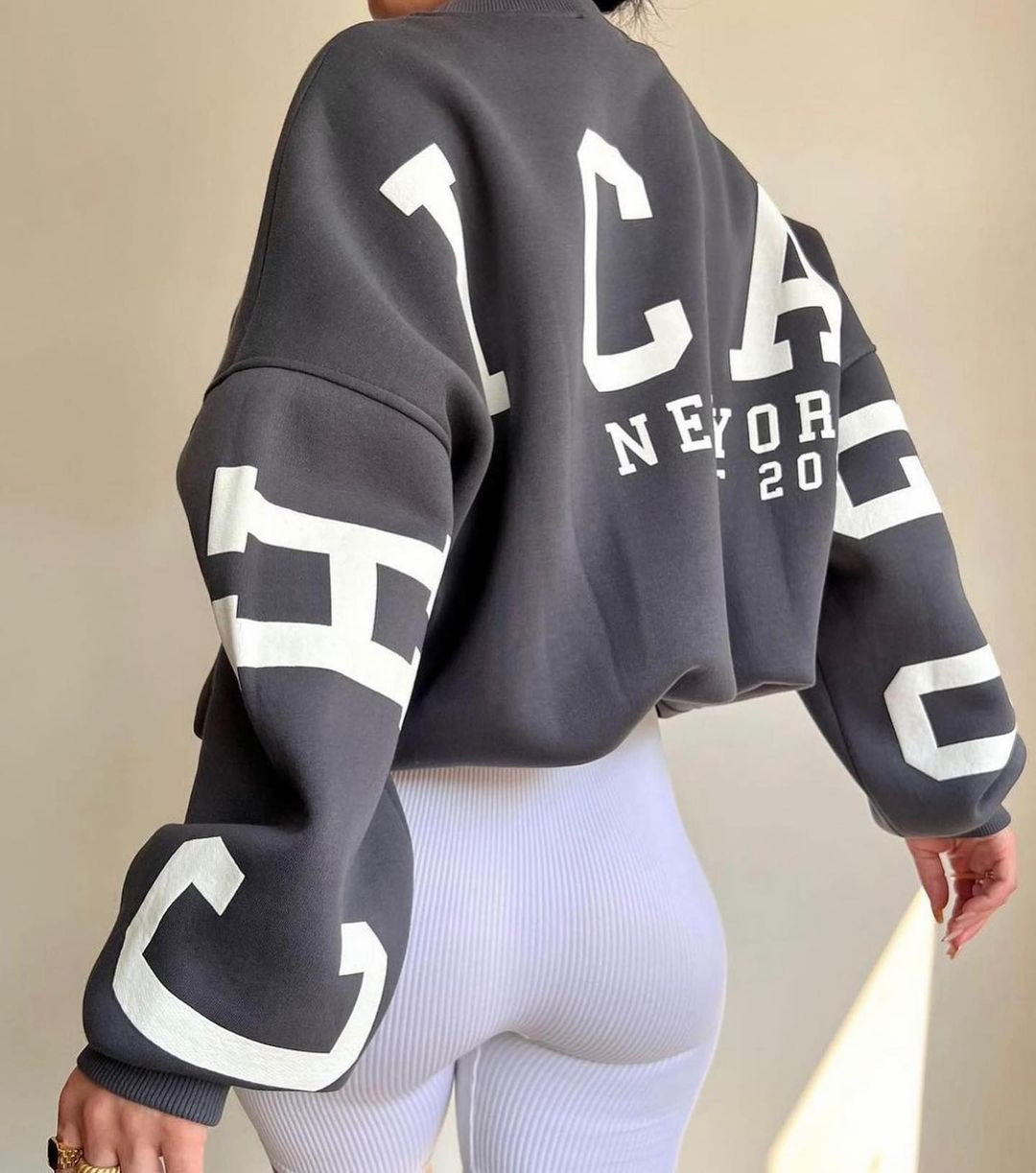 Marlen | Sweatshirt with striking green lettering on the sleeves