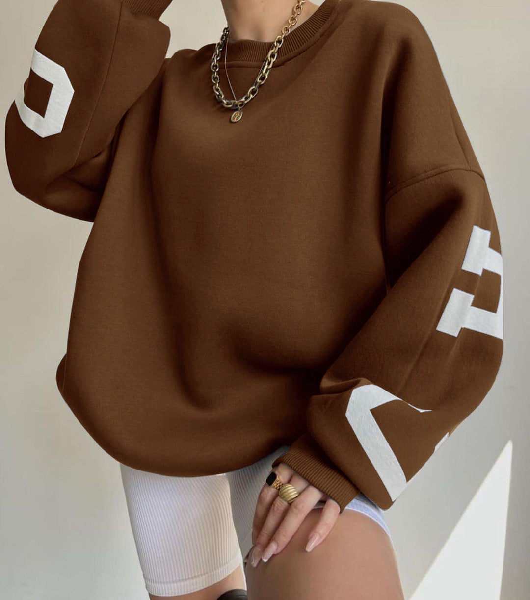 Marlen | Sweatshirt with striking green lettering on the sleeves