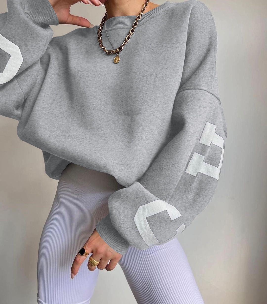 Marlen | Sweatshirt with striking green lettering on the sleeves