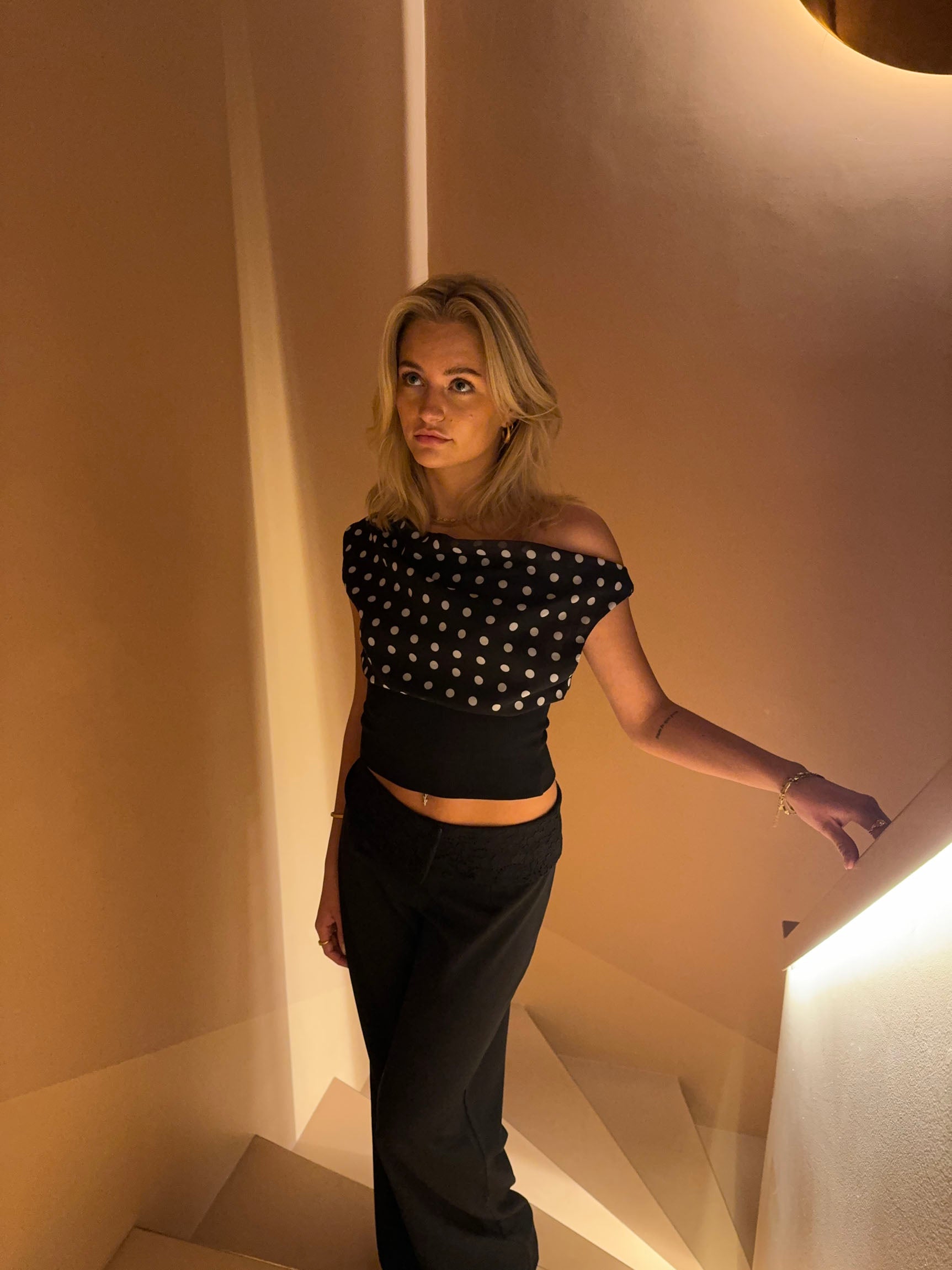 Zola | Top with Asymmetrical Polka Dot Sleeve