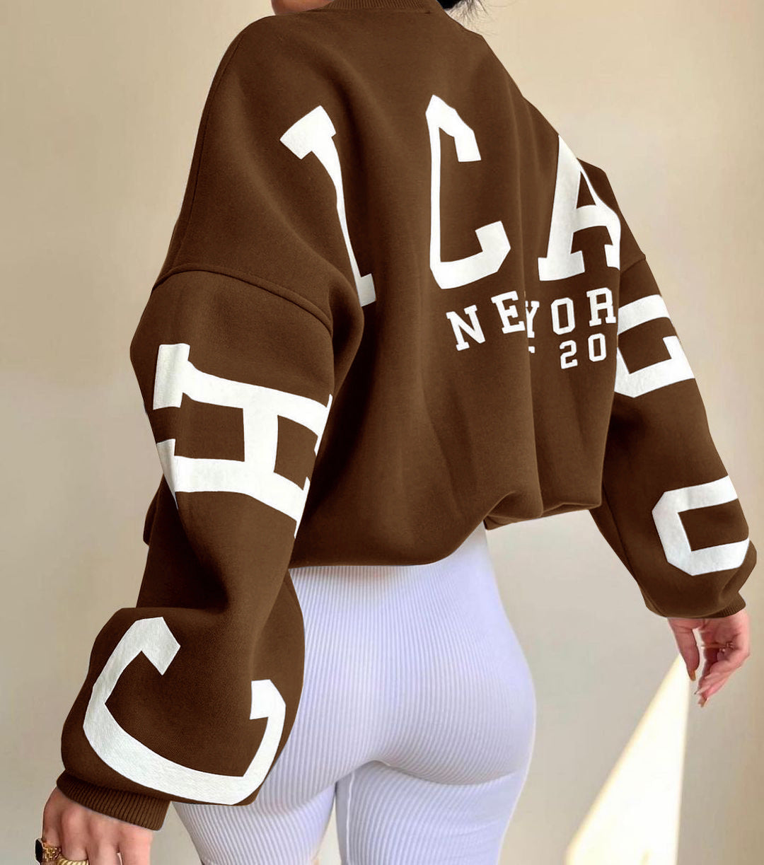 Marlen | Sweatshirt with striking green lettering on the sleeves
