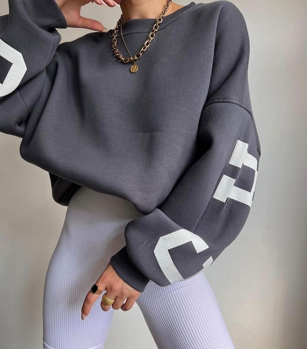 Marlen | Sweatshirt with striking green lettering on the sleeves