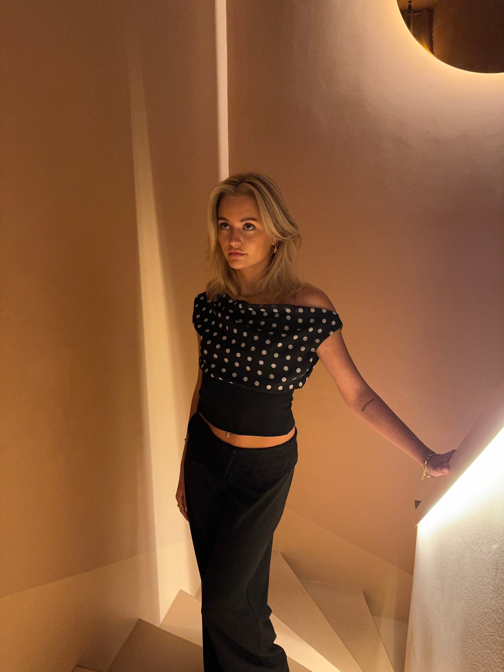Zola | Top with Asymmetrical Polka Dot Sleeve